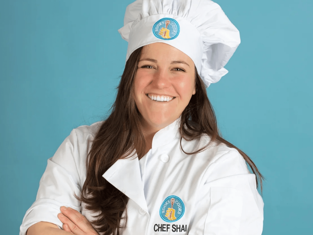 white chef in chef hat and coat
