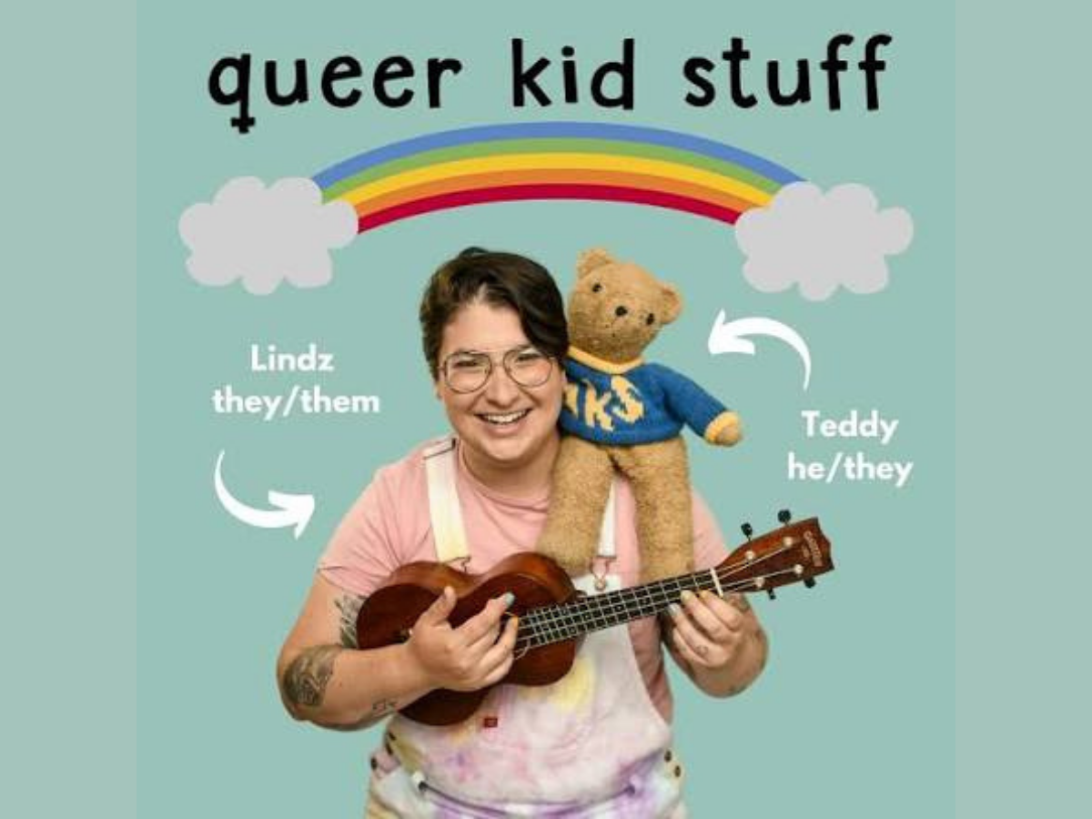 queer kids stuff title above rainbow underneath is Liz Amer is playing guitar with teddy