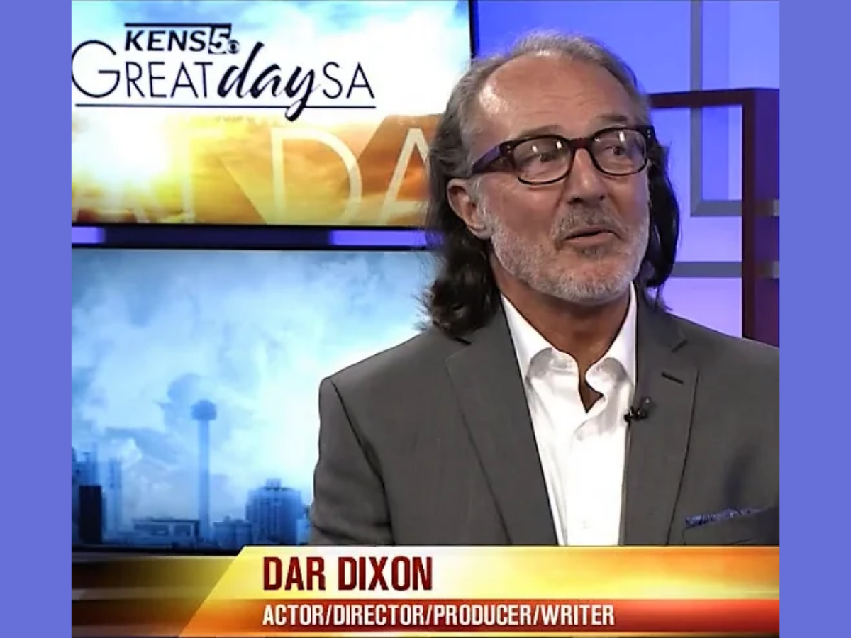 white man with grey beard on tv